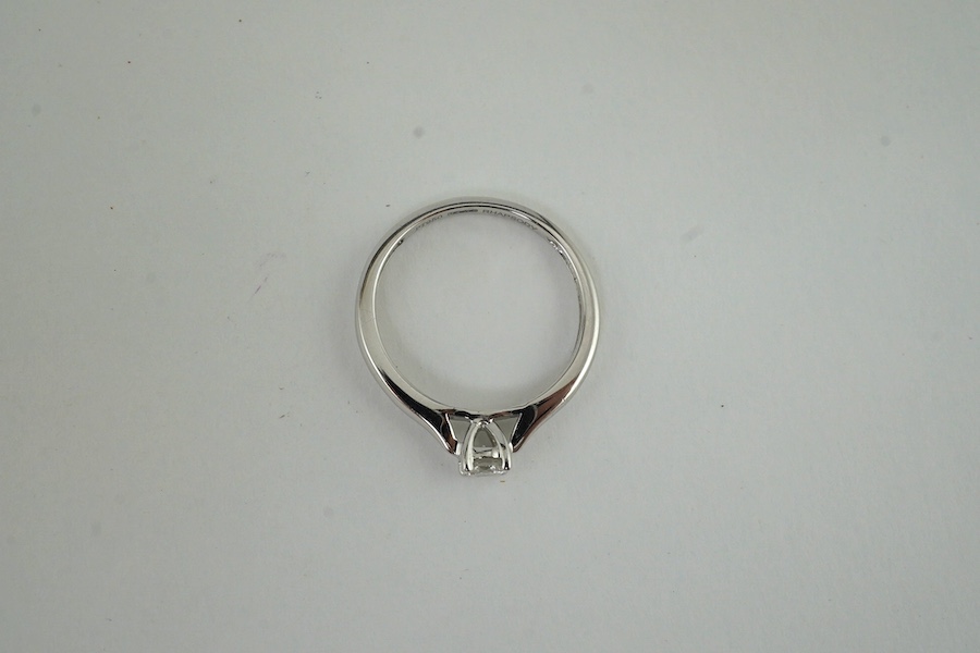 A modern Rhapsody platinum and solitaire diamond set ring, size N, gross weight 3.6 grams. Condition - good